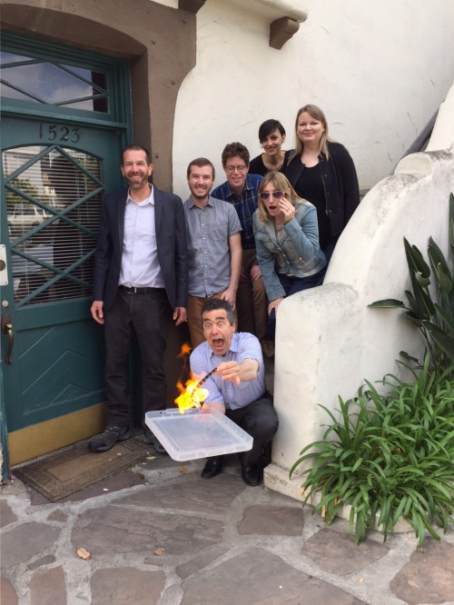 Serge Bromberg demonstrates film flammability for the Flicker Alley team outside Flicker Alley